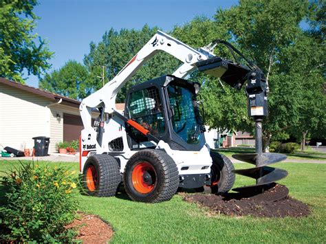 cool bobcat skid steer attachments